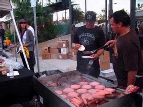 Flipping burgers for the hungry crowd celebrating the opening of Vans new HQ in Cypress