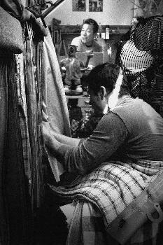 Greg Alterman looking at fabrics in Tokyo. Photo courtesy of Alternative Apparel.