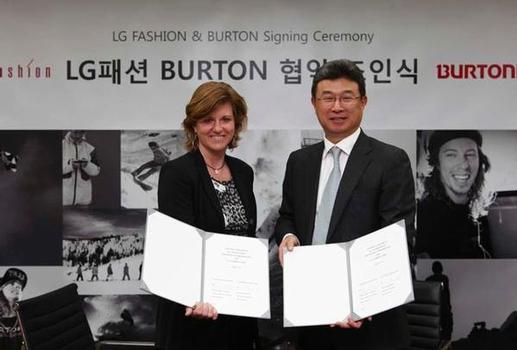 Burton co-owner Donna Carpenter in Korea with an executive from LG Fashion. Photo courtesy of Burton.