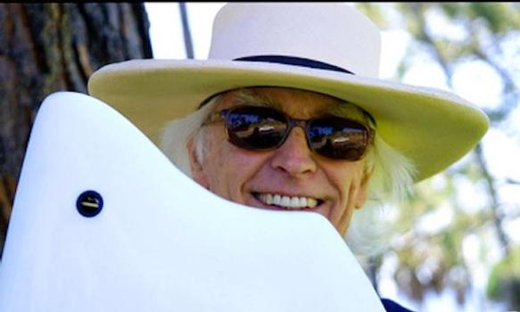Carl Ekstrom with the asymmetrical board. Photo courtesy of Sacred Craft.