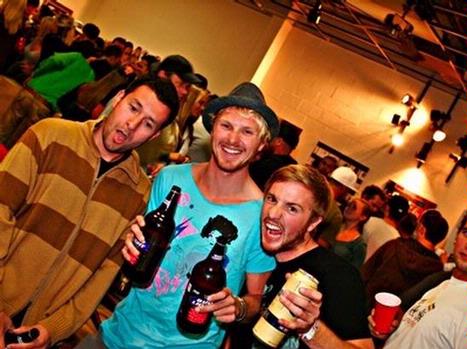 L to R: Stephan Garcia of skatewarehouse.com and Ambission owners Dustin Odbert and Dylan Odbert at Ambissionäó»s äóìHot dogs and Champagneäó  art show.