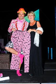 Fernando Aguerre with the pants he auctioned this year at the Liquid Nation Ball held at his home.