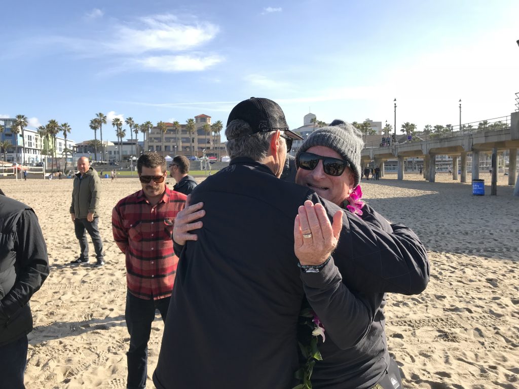 Tom Holbrook hugs Bob McKnight