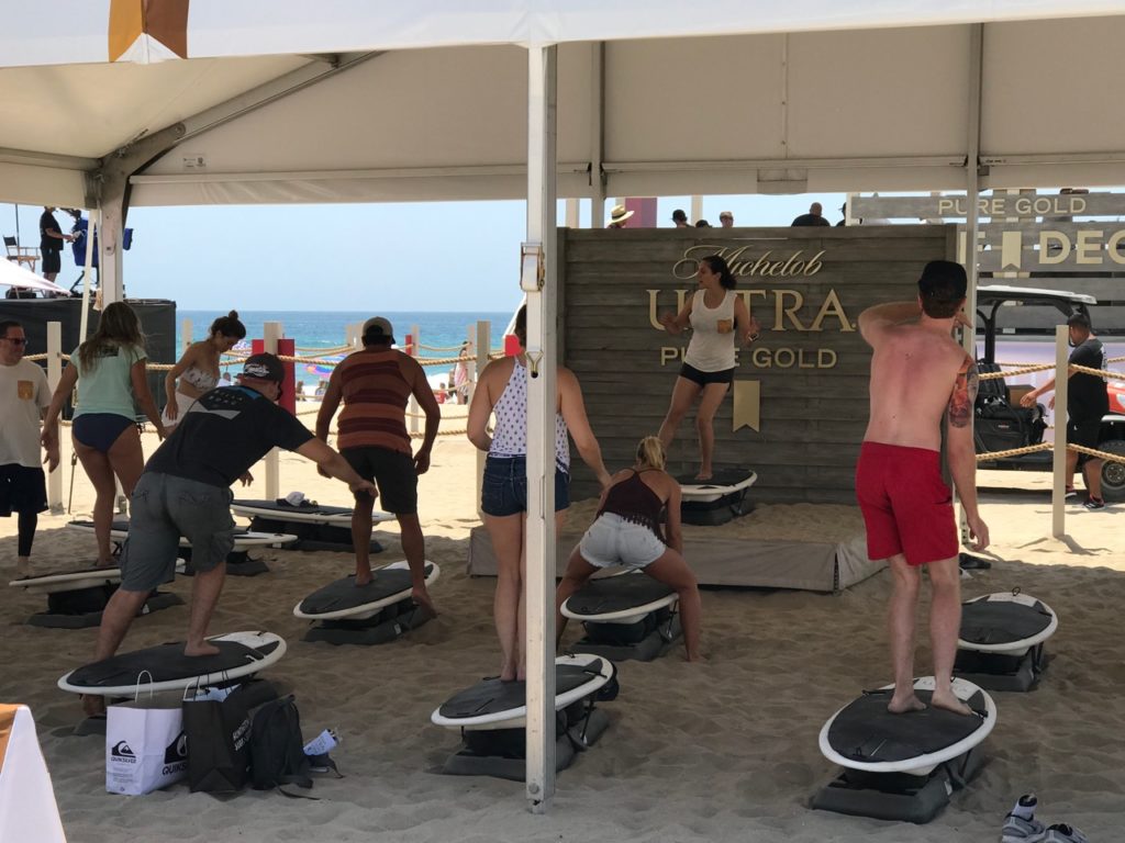 Taking advantage of the workout class on the sand
