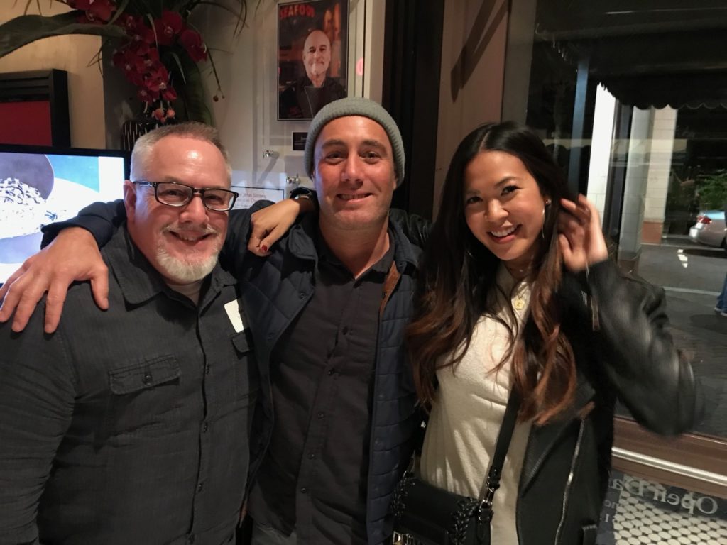 Steve Fisher of Surf Expo with Brian and Natalie Farias of Farias Surf in New Jersey