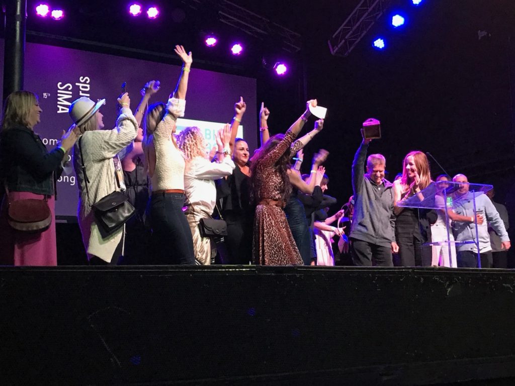 Billabong Women's celebrating their win for Apparel Brand of the Year