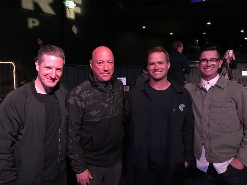 Brian White of Nixon, and Jason Shelton, Evan Slater and Mark Weber of Billabong before the ceremony