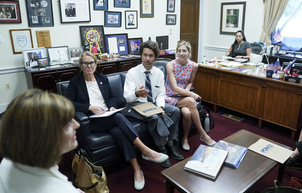 U.S. Representative Kathy Castor (D-FL 14th District) meets with Jeremy Jones, snowboarder and founder of Protect Our Winters, during Pro Athletes Join Protect Our Winters Action Fund In Urging Congress To Act On Climate Climate, Public Lands at Capitol Hill on September 12, 2019 in Washington, DC. Photo by Leigh Vogel/Getty Images