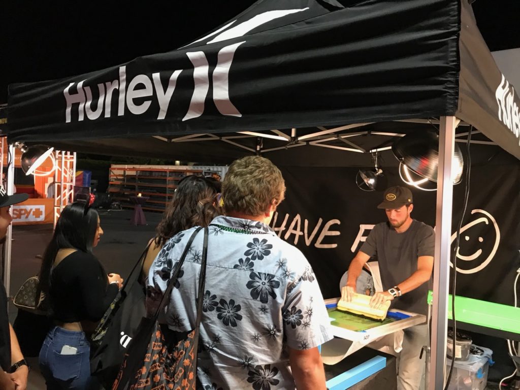 Making T-shirts in the Hurley booth
