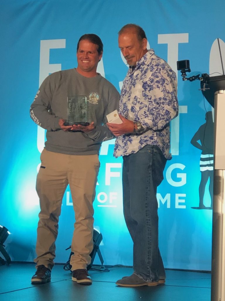 Damien Hobgood receiving his award for the East Coast Surfing Hall of Fame from President Gary Germain