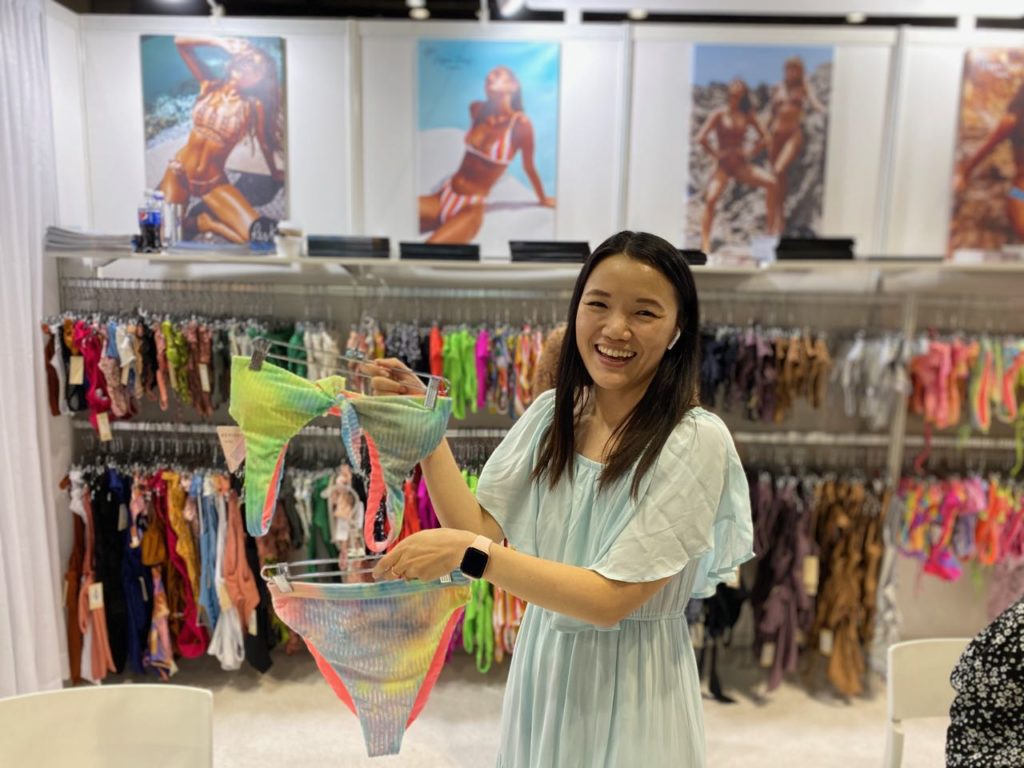 Elaine Tran, owner of Dippin Daisys Swim with a velvet bikini