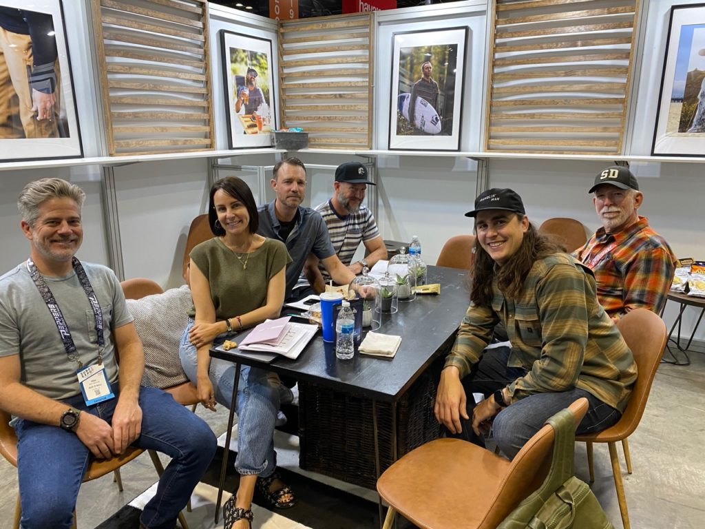 Clockwise from bottom left: O'Neill's Josh Wellington, Lindsay Henkels, Mark Tinkess, Snowy Lonsway, and Dave Nash and Patrick Whinnery of Sun Diego