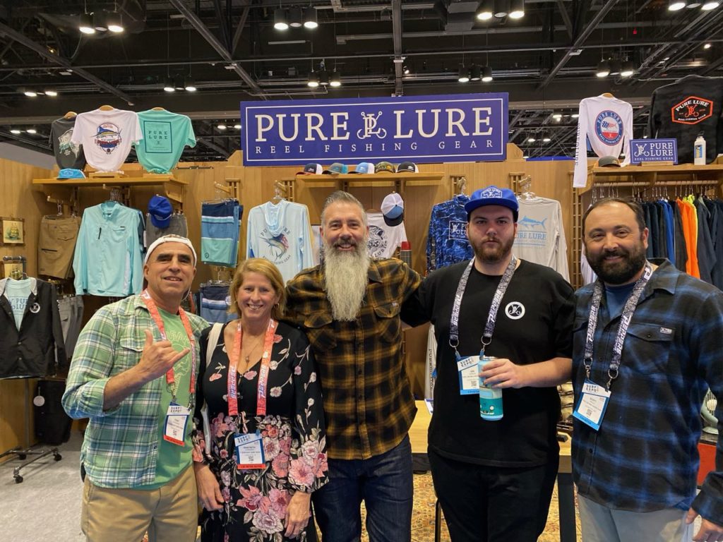 Tony and Marybeth Giordano of Ocean Hut Surf Shop and Brendan Hanley, Ian Hanley, and Scott Wells of Pure Lure