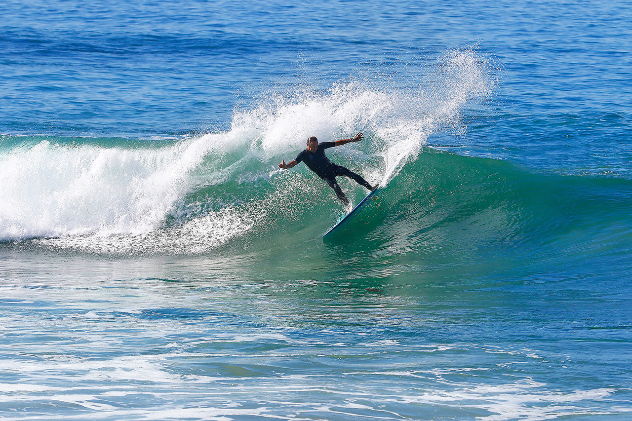PaulNaude surfing