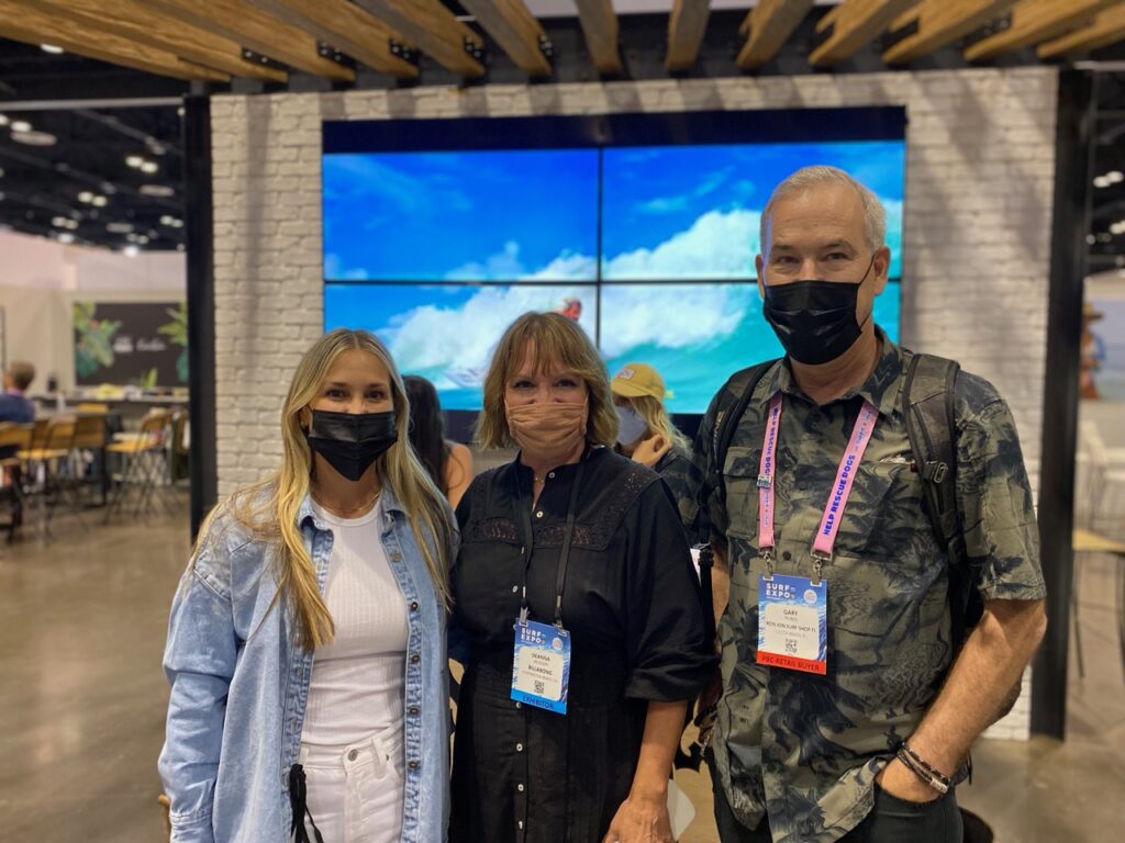 Erin Bouchard and Deanna Jackson of Billabong with Gary Rubin of Ron Jon