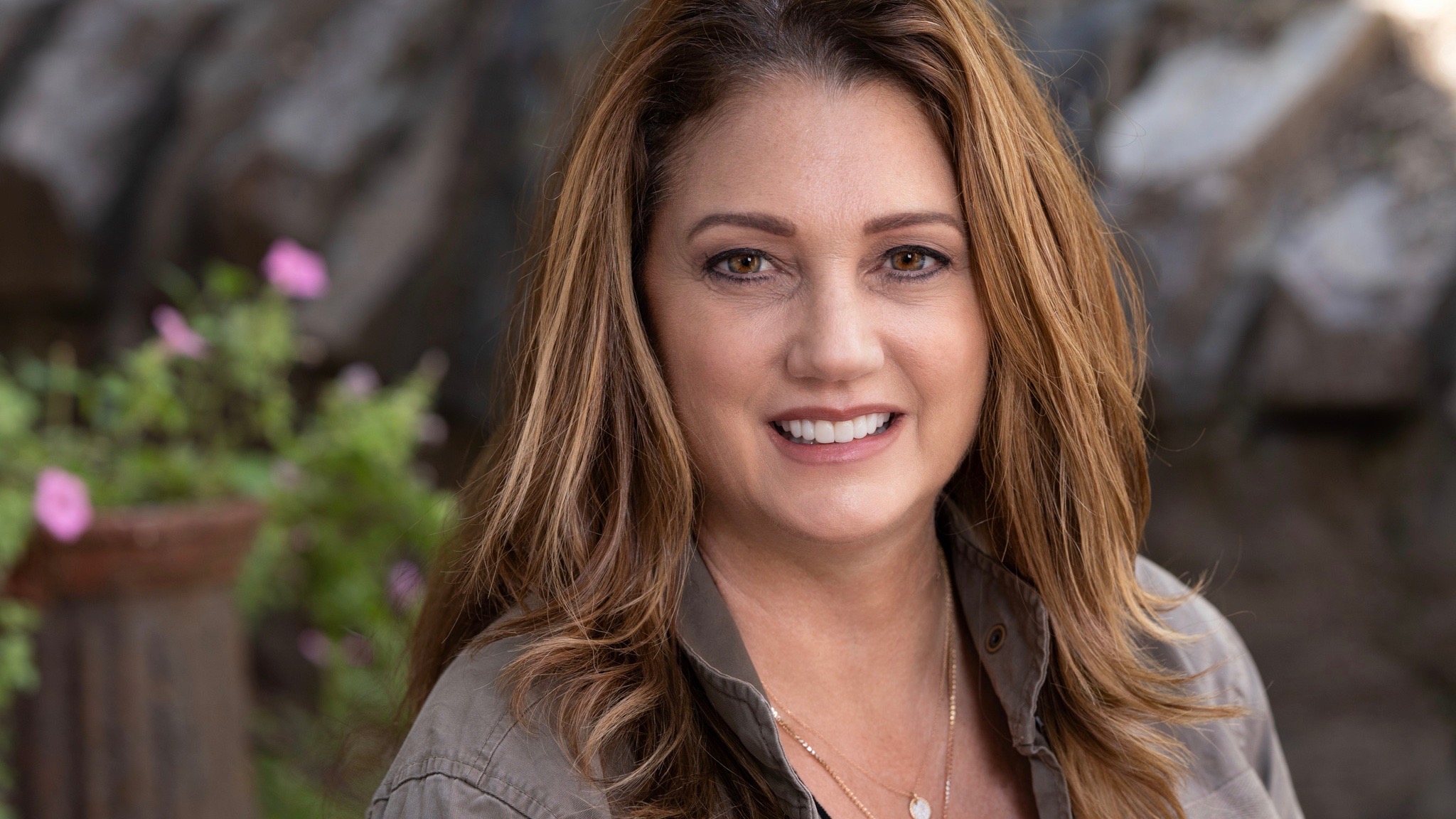 Monica Mirro green jacket Headshot