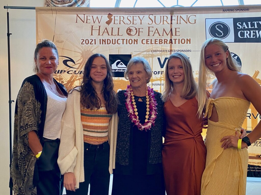 Barbara Heritage, center, who founded Heritage Surf & Sport with her husband, Dan, and some of her family, including daughter in-law Jamie Heritage, far left