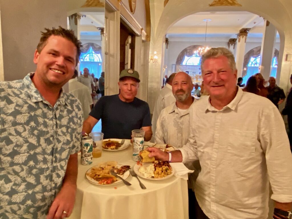 Quiksilver's Mike Reilly and Jay Williams, Andrew Traa of Heritage, Bob McKnight of Quiksilver