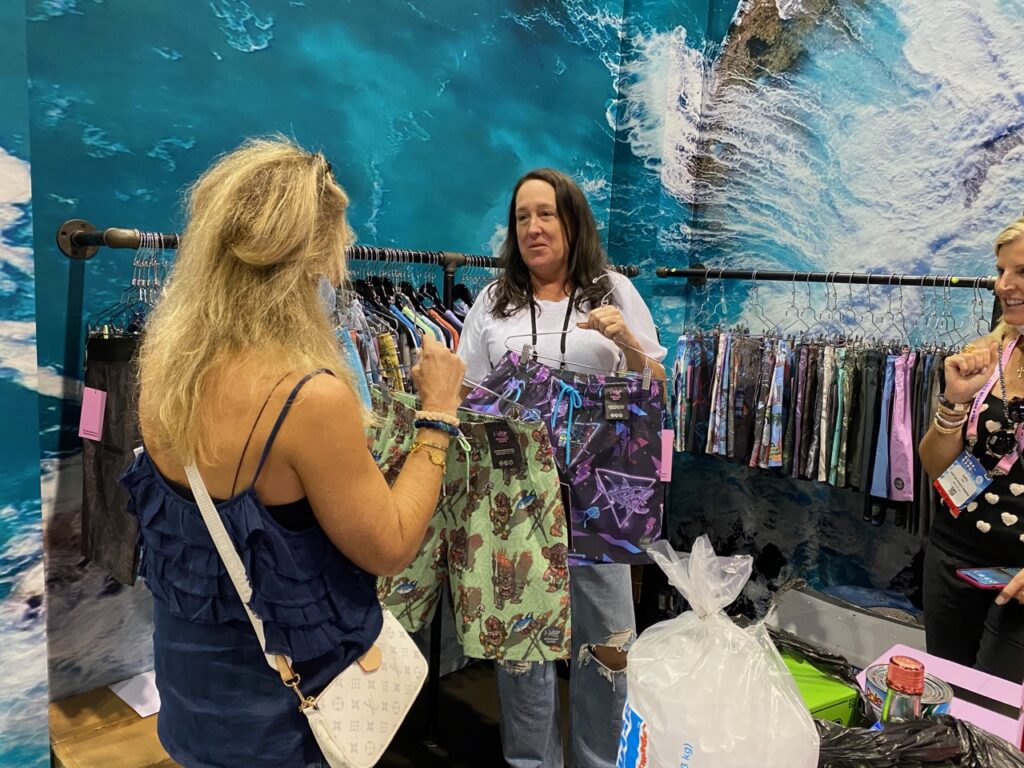 Shawnna Graham of Poplar Pointe Marine in Virginia checking out trunks at Psycho Tuna with Patricia Thornton