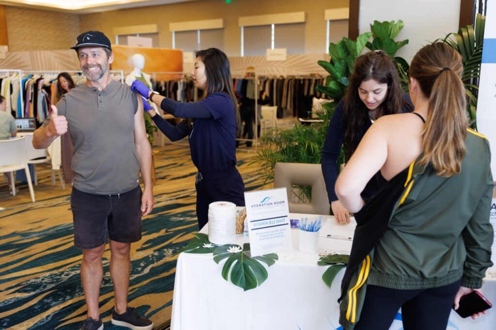 Brian Carlin of Vuori getting a B12 shot