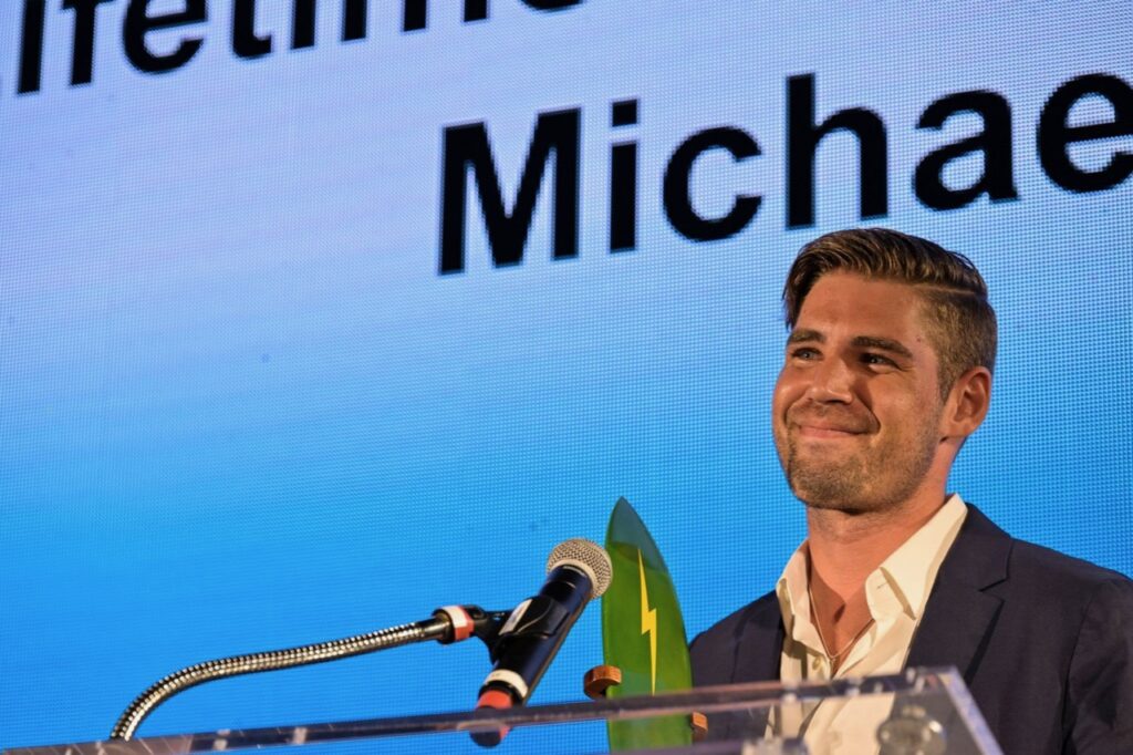 Oliver Tomson accepts the Lifetime Achievement Award on behalf of his father - Photo courtesy of SIMA