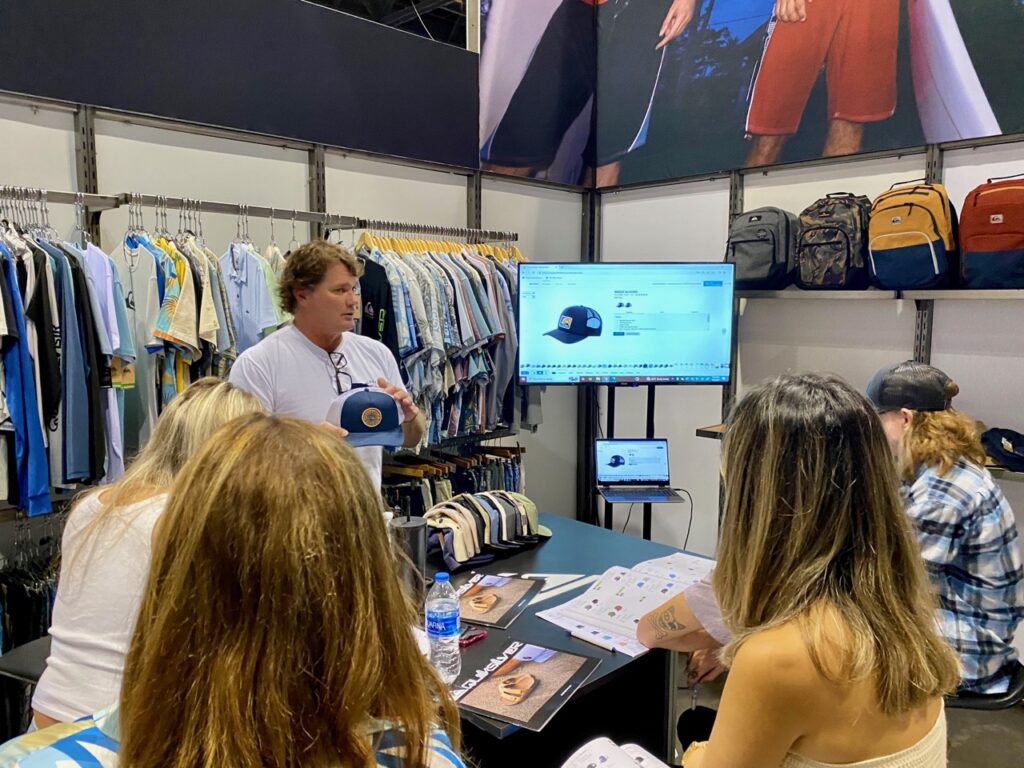 Quiksilver had monitors in booths showcasting the Elastic B2B platform to encourage less use of printed catalogs
