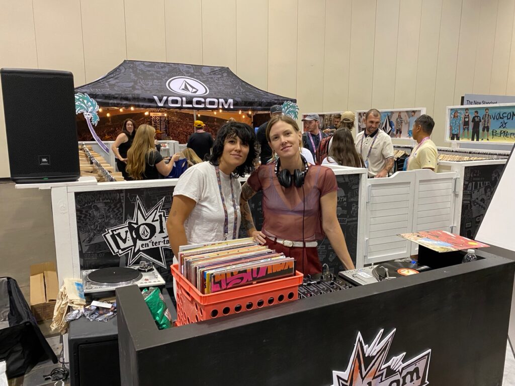 DJs Lena Simon and Glenn Van Dyke at the Volcom booth