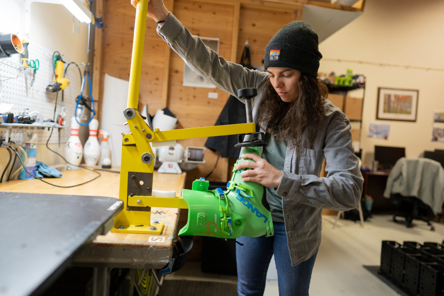 Annabelle Cooper working on boots at Powder7